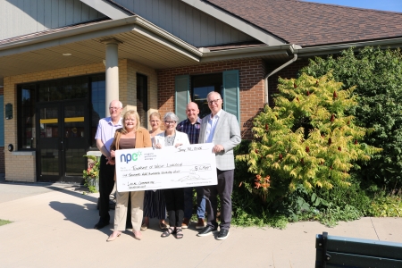 the photo shows a group photo with NPEI staff and West Lincoln dignitaries at a cheque presentations in West Lincoln